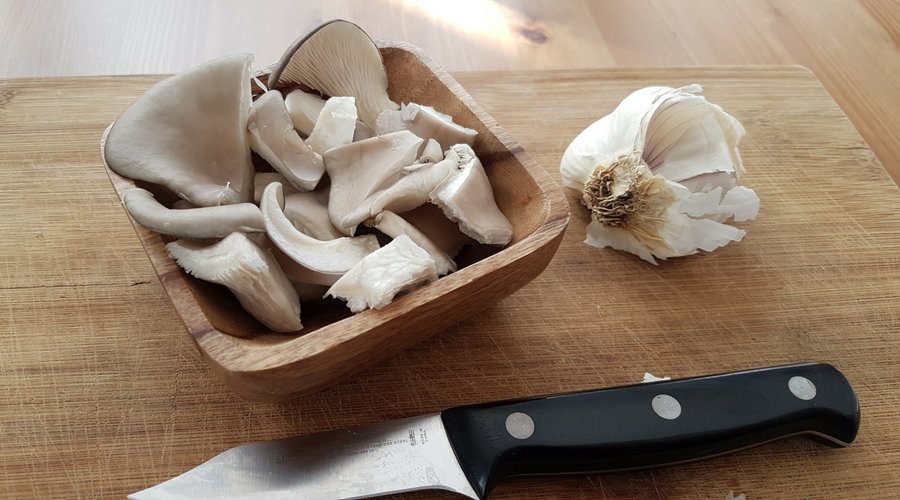 chopped up pearl oyster ready for cooking